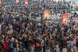 China says Covid outbreak has infected 80% of population