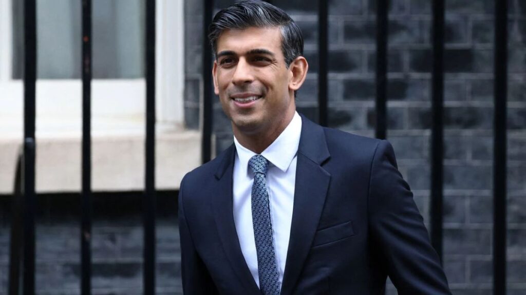 British PM reshuffles top team, creates new departments