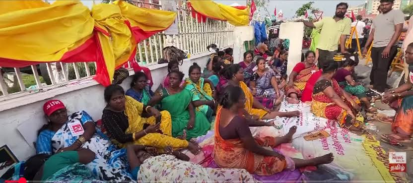 Sanitation workers continue protest overnight after arrests