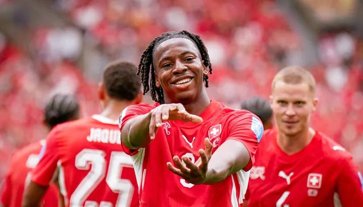 Switzerland cruises past Algeria as Manzambi shines