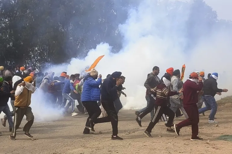 Police fire tear gas at farmers march
