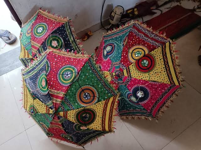 Umbrella and raincoat sales surge as NE Monsoon sets in