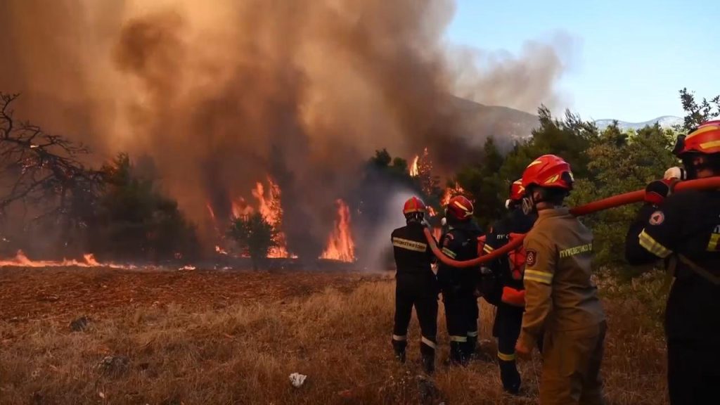 Greek wildfires halted after chopper crash